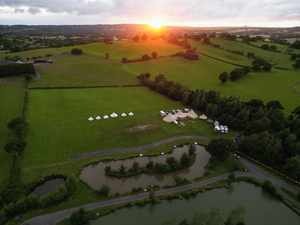 Alcott Weddings Tipi Venue Worcestershire drone sunset wedding glamping