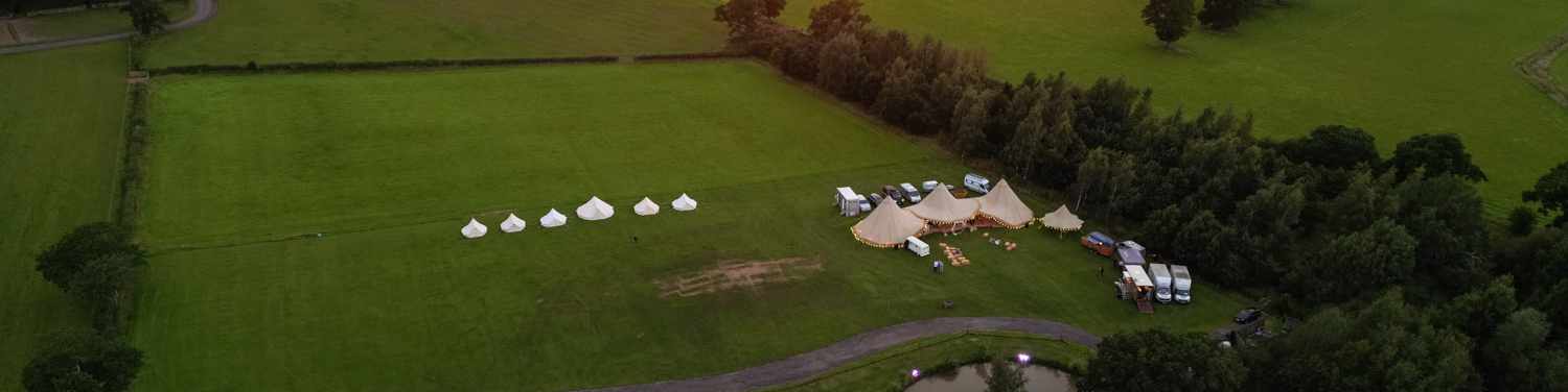 Alcott Weddings Tipi Venue Worcestershire drone sunset wedding glamping