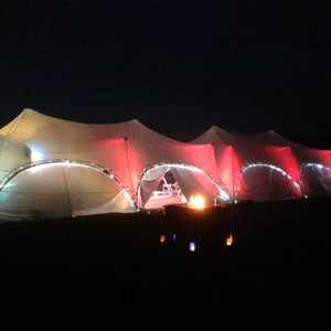 Capris marquee by night Alcott Weddings