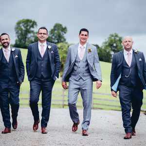 The boys leaving Granny's Lodge to make their way to the wedding field.jpg