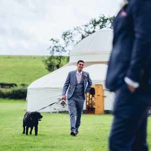 The groom and his dog read for the ceremony