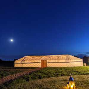 Long Yurt Outside evening shot Alcott Weddings Outdoor Venue Worcestershire