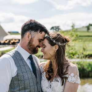 Tipi, lake and country farm views wedding