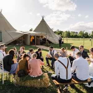 y chilling at the tipi wedding