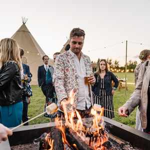 wedding firepit roasting marshmellows