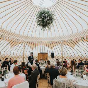 Yurt seated round tables Alcott Weddings Outdoor Venue Worcestershire